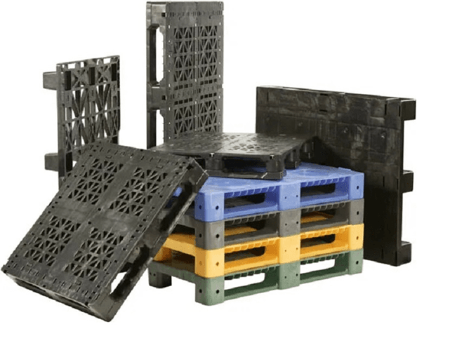 Plastic pallets in various colors stacked together
