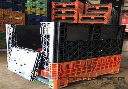 Pallet Containers For Sale: New 30x32x34 Collapsible Bulk Boxes w. 2 Drop Doors - Orange Base Black Walls In Indiana - image 1 Pallet Containers For Sale: New 30x32x34 Collapsible Bulk Boxes w. 2 Drop Doors - Orange Base Black Walls In Indiana - image 1